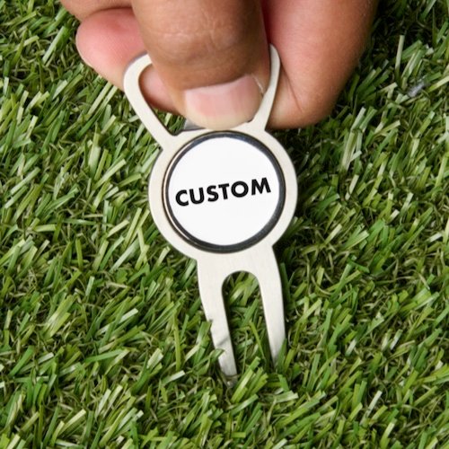 Personalized custom Bottle Opener Magnetic Golf Ball Marker and Divot Tool pictured in grass.