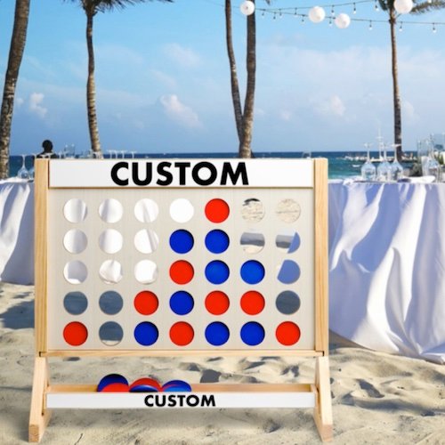 Personalized custom Giant Fast Four pictured as wedding game on beach.