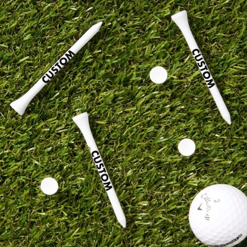 Personalized custom Golf Tees - WHITE tees with golf ball on grass.