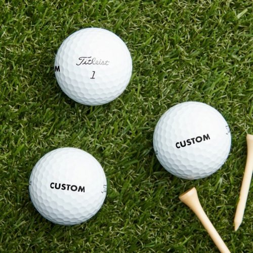 Personalized custom Titleist Pro V1 Golf Balls on grass Personalized custom Titleist Pro V1 Golf Balls on grass.
