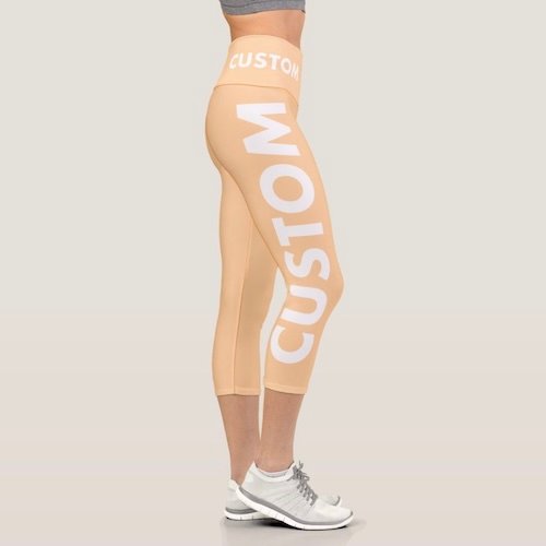 Peach high waisted custom capris all over print personalized capri pants right side view close up Peach high waisted custom capris all over print personalized capri pants right side view close up.